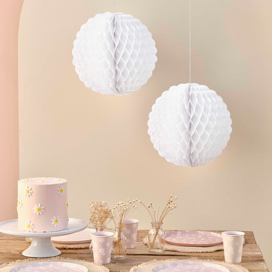 White scalloped honeycomb decorations